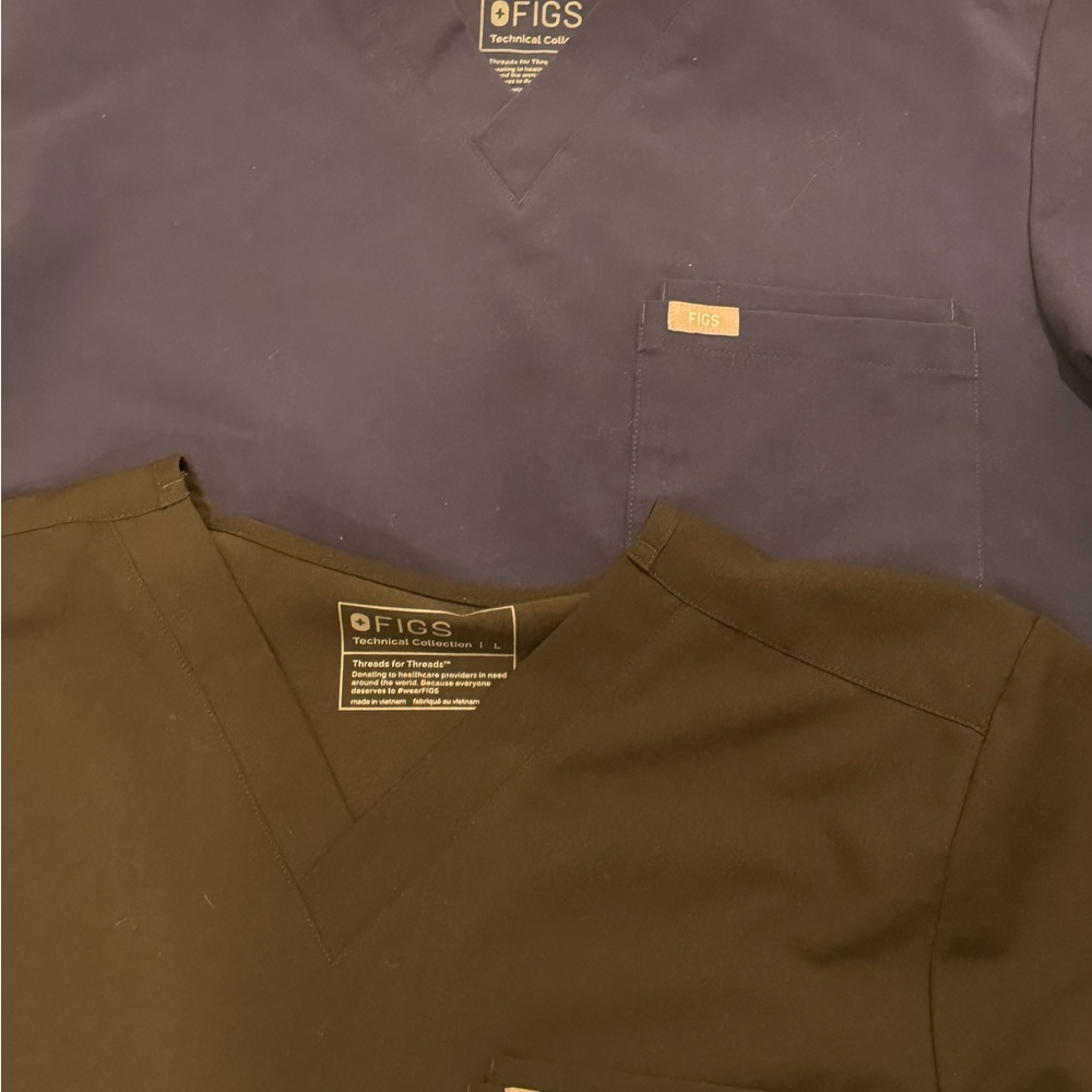 4 Leon figs scrub tops. Size large. Gently used condition. Ceil blue, navy,black